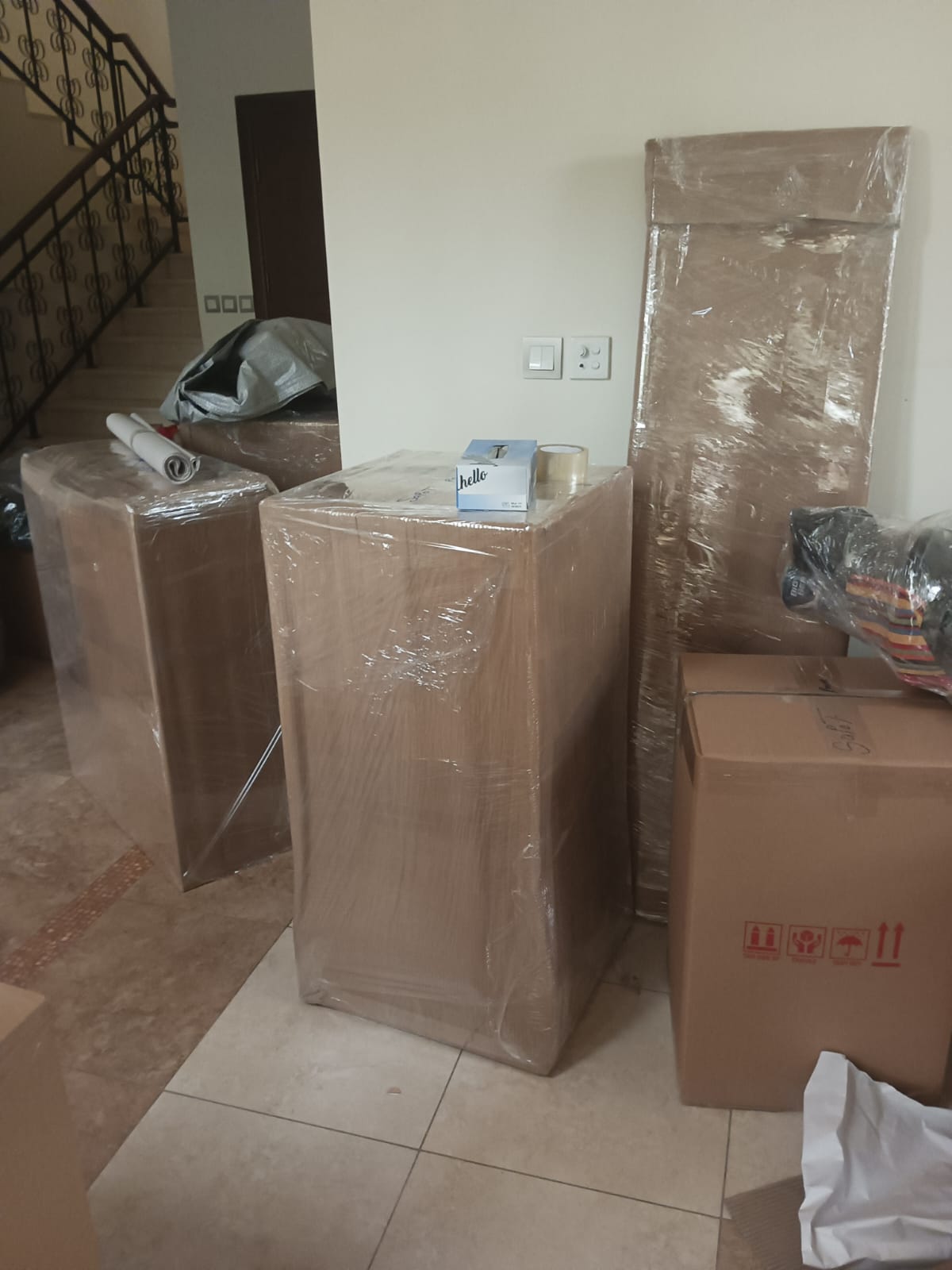 Packing kitchenware into boxes